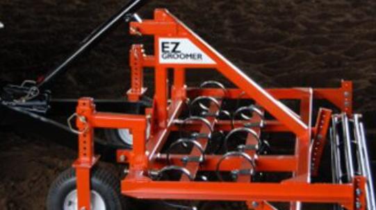 An EZ Groomer arena drag.